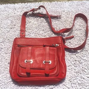Danier red leather crossbody bag with lots of pockets